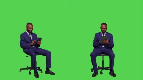 African American Man Scrolling Through Internet Website