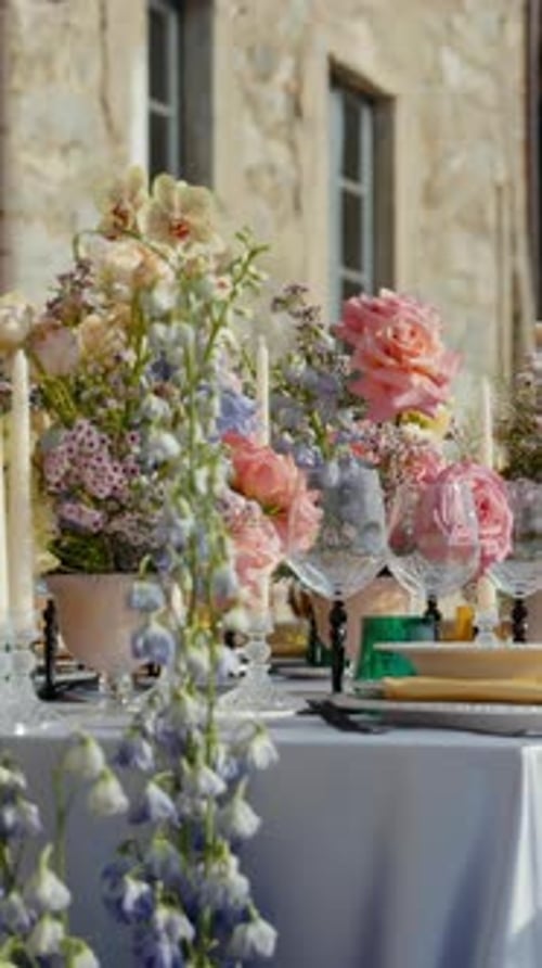 Elegant Floral Wedding Table Setting in Natural Light