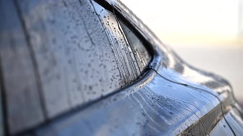 Water Droplets on Car Window After Car Wash