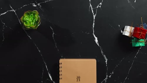 2023 notebook on black marble surface