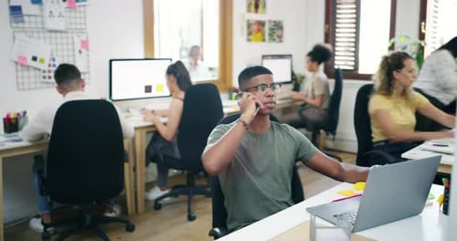 4k video footage of a group of young businesspeople working together modern office