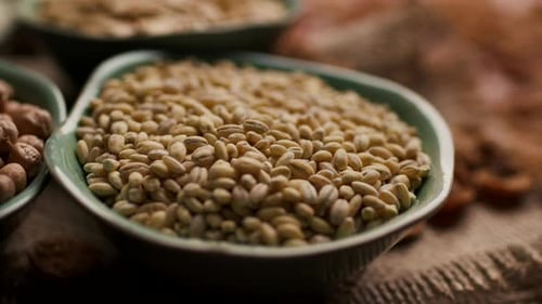 Close Up of Barley Grain Bowls on Burlap