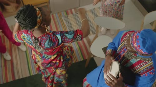 Family Celebrates with Music and Dance at Home