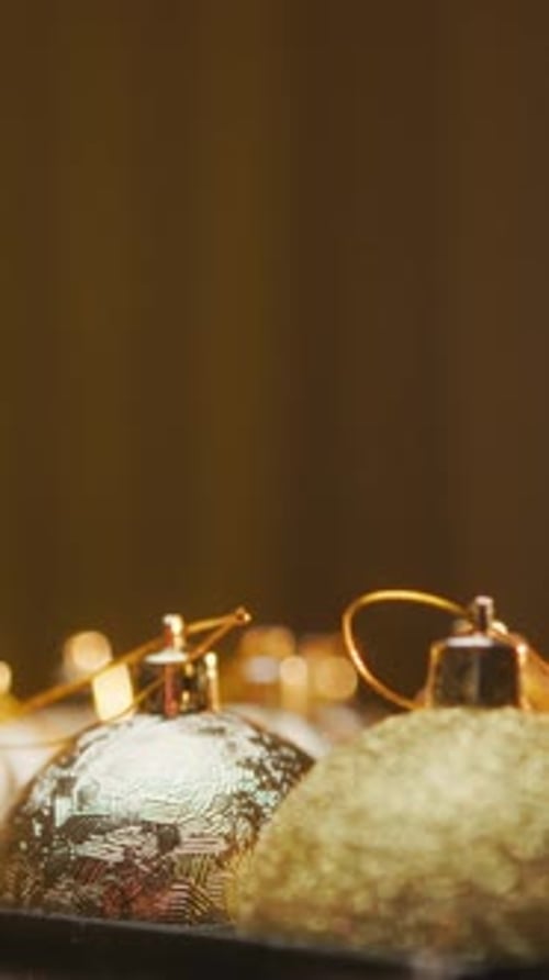 Golden Christmas Ornaments Rotating Close Up