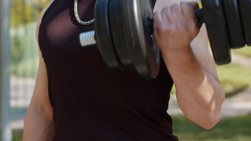 Closeup Athletic Man Doing Arms Weight Lifting Dumbbells Exercises Pumping Up Arm Bicep Muscles