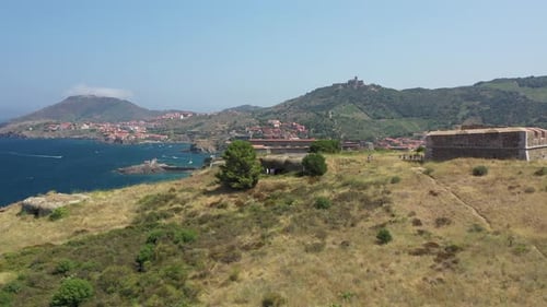 Aerial shot near the historical town and port of Collioure and the French Spanish border at the Medi