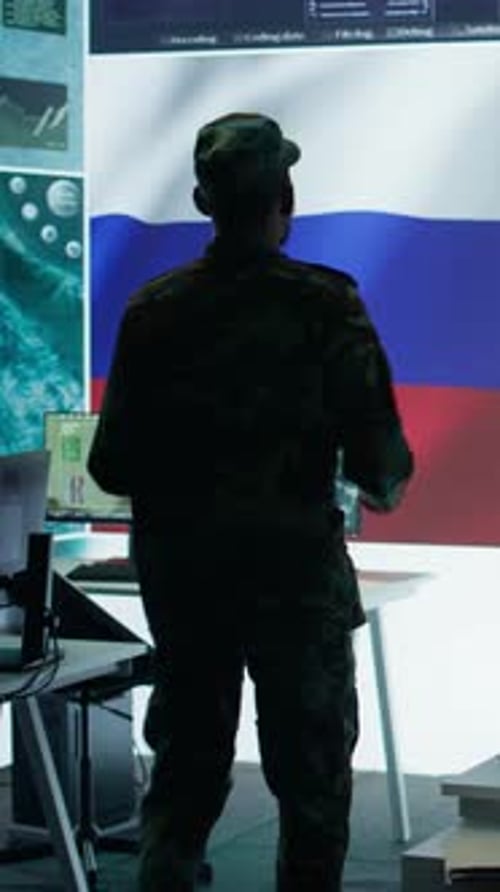 Vertical Video Military Expert From Russian Army Working in Governmental Base of Operations