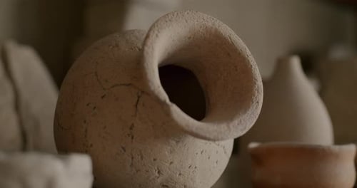 Closeup of Handmade Ceramic Pot Indoors in Pottery Workshop with No People Visible
