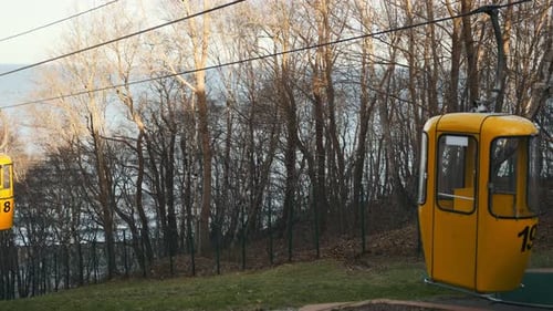 Cable Car Ride Offers Stunning Views of the Sea During Golden Hour in a Coastal Location