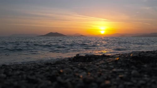 Sunset Over the Ocean and Beach
