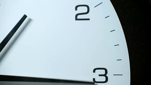 Timelapse of Clock Hand Moving From Two to Three O'clock
