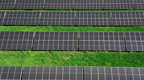 Aerial top view of photovoltaic solar panels. Solar cell panels in a photovoltaic power plant.