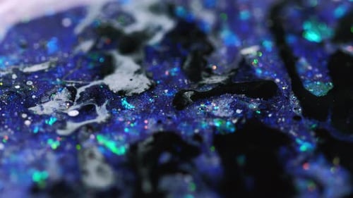Macro Shot of Blue and Black Glittering Galaxy
