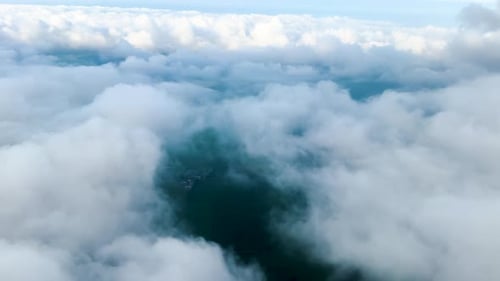 Aerial View of Fluffy White Clouds Landscape