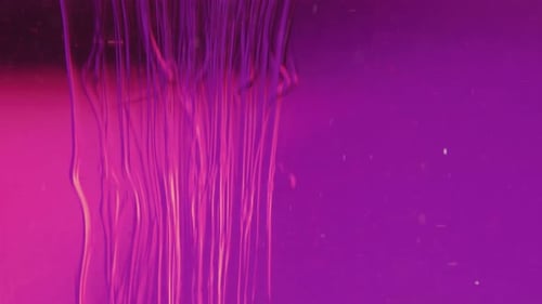 Abstract Pink Liquid Cascade on Purple