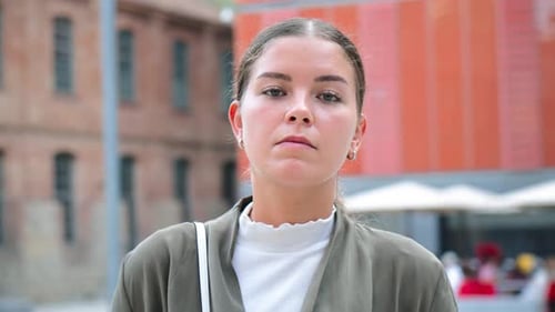 Young Woman Portrait Close Up in Urban Setting