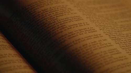 Close-up View of an Open Bible Page