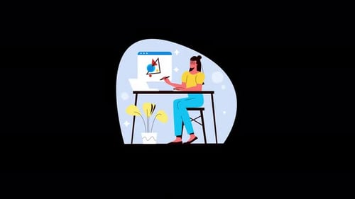 Woman designing at a desk with a laptop and digital art
