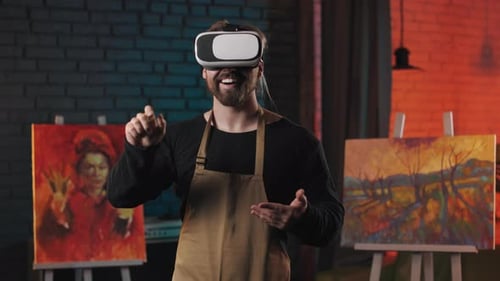 Man in VR Glasses Painting in Art Studio