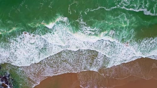 Aerial Ocean Waves Rolling to Empty Sand Shore Turquoise Sea Water Washing