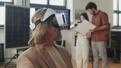 Male Engineer Using AR Headset at Renewable Energy Company