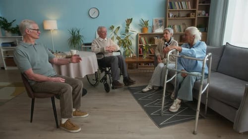 Seniors Socializing in Cozy Nursing Home Living Room