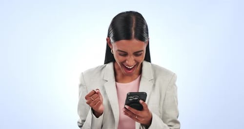 Happy Woman Looking at Phone with Excitement