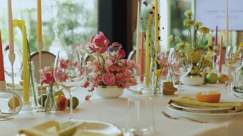 Elegant Table Setting With Flowers and Candles