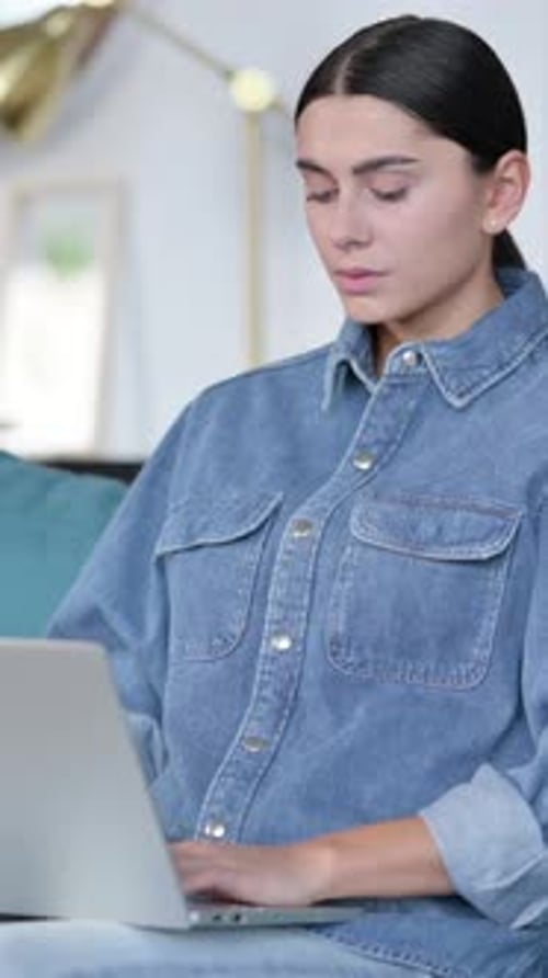 Young Woman Typing Then Massaging Sore Wrists at Home