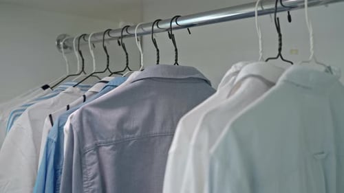 Neatly Hung Shirts in an Organised Wardrobe