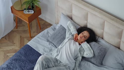 View From Above Caucasian Tired Woman Falling Lying in Bed Fall Relaxing Stretching Female Exhausted