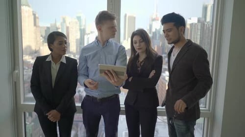 start up company employees discussing business strategy target in modern office