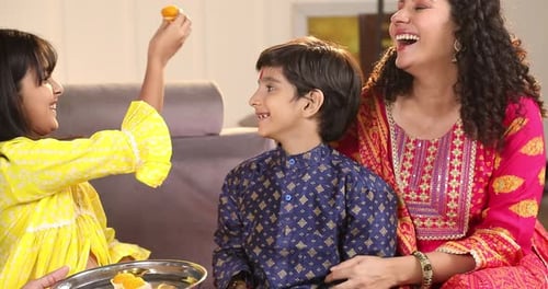 Family Sharing Sweets Together in a Home Setting
