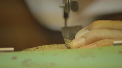 Italian Goldsmith at work building an engagement or a wedding ring.