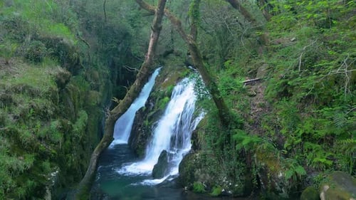 Cascades On Narrow River Rock Mountains In Santa Leocadia Waterfall Near Mazaricos In Galicia Spain.