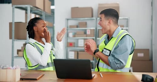High five, laptop and shipping with people in warehouse for logistics deal