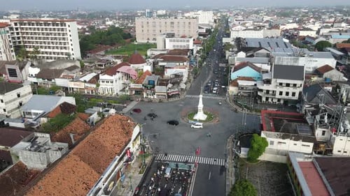 Cinematic aerial view of Tugu Jogja or Yogyakarta Monument, Indonesia.