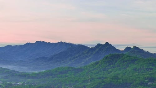 Aerial scenery of mountain range landscape with sunrise sky.Indonesia natural rural landscape.