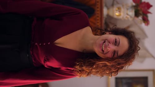Smiling Woman with Curly Hair in Home Interior