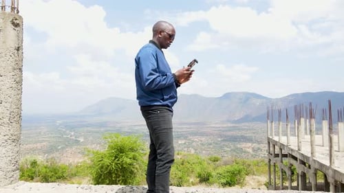 African engineer inspector surveillance operating drone pilot. Drone pilot engineer uav copter techn