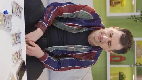 Adult Counting Money at Home