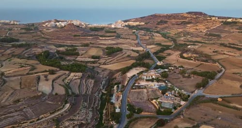 Aerial View of Cultivated Fields and Roads Crossing the Island of Comino Malta