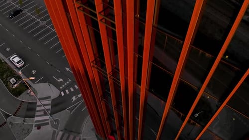Establishing Shot of Glass Business Centre and Parking Lot
