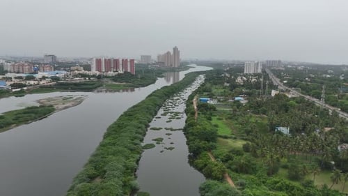 Drone footage shows the Buckingham Canal and Chennai City's East Coast Road neighbourhood. Dramatic
