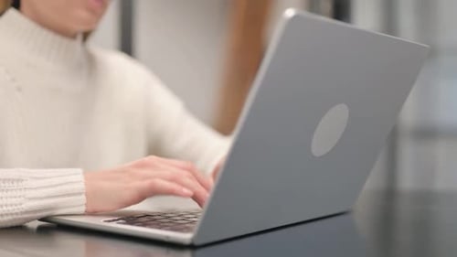 Close up of Woman Typing on Laptop
