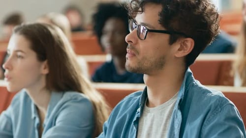Students in Classroom Setting During Lecture