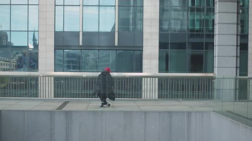 modern african american hip hop cool rapper dancing under skyscraper in urban jungle