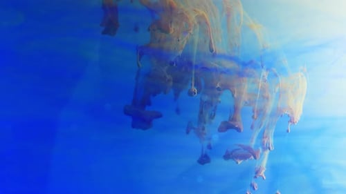 Abstract Flowing Ink in Blue Liquid