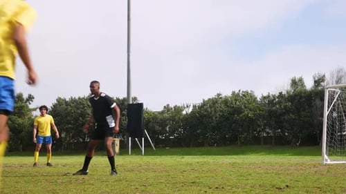 Soccer Players Celebrate After Scoring a Goal