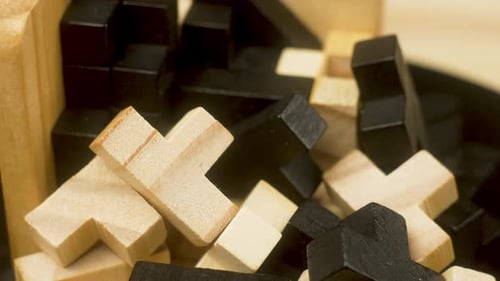 Close Up Piece of Wooden Block Puzzle Logical Task Slow Motion Concept of Complex and Smart Logical